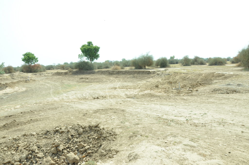 View of hardened non-permeable low-lying land